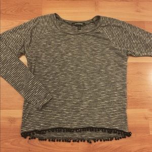 Gray and black sweater